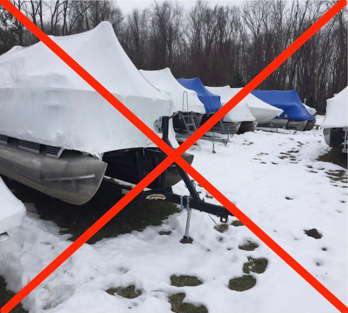 Outdoor winter boat storage with snow exposure